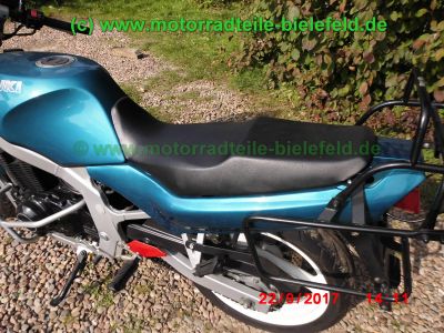 Suzuki_GS500E_GM51B_gruen_46PS_16tkm_tiefer_gelegt_GIVI_Halbschalen_-Verkleidung_Sturzbuegel_Hepco-Becker_Gepaecktraeger_Koffertraeger_Motor_M502_sehr_gepflegt-36.jpg