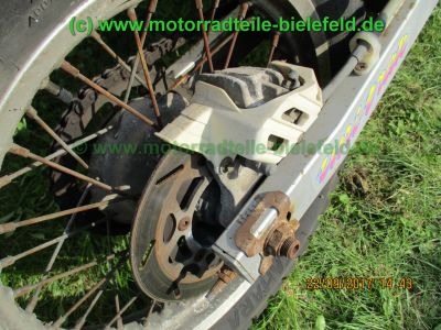 Kawasaki_KLX650C_Hard-Enduro_gruen_1Hd_33kW_EZ93_ausser_Betrieb_2006_USD-Gabel_grosser_Acerbis-Tank_Motor_-98.jpg