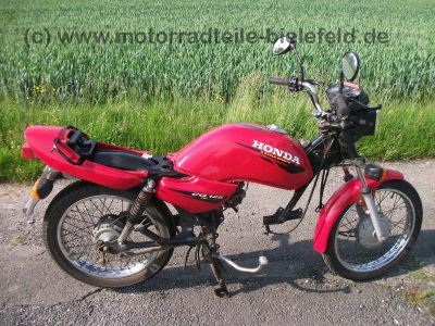 Honda_CG_125_CG125_JC27__rot_teilzerlegt_neue_Motorteile_CB_CBF_CBZ_CBX_125_83.jpg