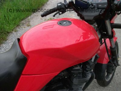 Suzuki_GSX550ES_GN71D_GSX550_GSX_550E_550ES_550EF_500_550_600_750_E_ES_EF_feuerwehrrot_70_.jpg