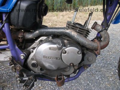 Suzuki_DR125SE_SF44A_blau_2x_Zylinderkopf_DR_GN_GZ_125_S_SE_125S_125SE_SF_43_44_SF43_SF44_A_B_43B_44A_GN125_GZ125_49.jpg