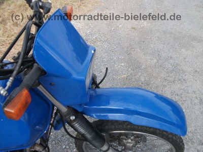 Suzuki_DR125SE_SF44A_blau_2x_Zylinderkopf_DR_GN_GZ_125_S_SE_125S_125SE_SF_43_44_SF43_SF44_A_B_43B_44A_GN125_GZ125_51.jpg