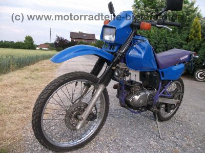 Suzuki_DR125SE_SF44A_blau_2x_Zylinderkopf_DR_GN_GZ_125_S_SE_125S_125SE_SF_43_44_SF43_SF44_A_B_43B_44A_GN125_GZ125_67.jpg