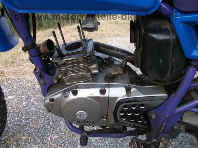 Suzuki_DR125SE_SF44A_blau_2x_Zylinderkopf_DR_GN_GZ_125_S_SE_125S_125SE_SF_43_44_SF43_SF44_A_B_43B_44A_GN125_GZ125_80.jpg