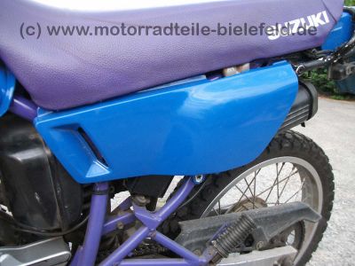 Suzuki_DR125SE_SF44A_blau_2x_Zylinderkopf_DR_GN_GZ_125_S_SE_125S_125SE_SF_43_44_SF43_SF44_A_B_43B_44A_GN125_GZ125_86.jpg