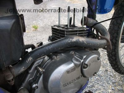 Suzuki_DR125SE_SF44A_blau_2x_Zylinderkopf_DR_GN_GZ_125_S_SE_125S_125SE_SF_43_44_SF43_SF44_A_B_43B_44A_GN125_GZ125_98.jpg