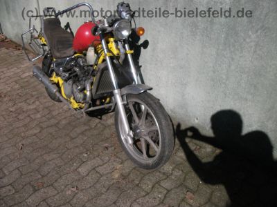 Kawasaki_EN_450_A_LTD_mit_Harley_Tank_vorverlegte_Fussrasten_Ledersitz_SITO_Auspuff_-_wie_EN_LTD_450_454_500_A_LTD_5.jpg