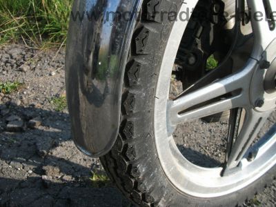 Honda_CB_400_T_blau_orig__Auspuff_HM_413_414_Gepaecktraeger_-_wie_CB_CM_250_400_450_T_N_118.jpg