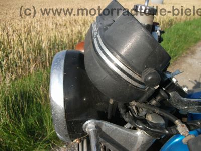 Honda_CB_400_T_blau_orig__Auspuff_HM_413_414_Gepaecktraeger_-_wie_CB_CM_250_400_450_T_N_68.jpg