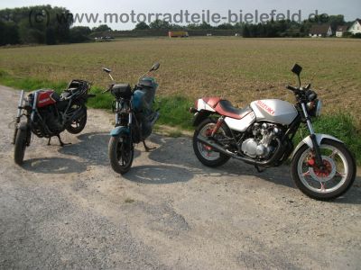 Suzuki_GS_550_M_Katana_silber-rot_Stahlflex_orig__Auspuff_DGM_38634_S_-_wie_GS_500_550_D_E_L_1.jpg
