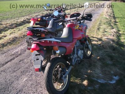 Honda_NX_650_Dominator_RD08_rot_1_Hd__Super-Moto_SuMo_17x2_50_u__17x2_75_-_wie_XL_XR_NX_SLR_FMX_500_600_650_RD_02_06_09_10.jpg