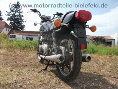 Suzuki_GS_400_E_Twin_Zwei-Zylinder_Klassiker_original_Auspuff_DGM_31914_S_-_wie_GS_500_550_750_D_E_L_T_8.jpg