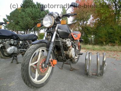 Suzuki_GS_650_G_KATANA_teilzerlegt_orig__Auspuff_-_wie_GS_500_550_750_1100_D_E_G_ES_EF_Katana_10.jpg