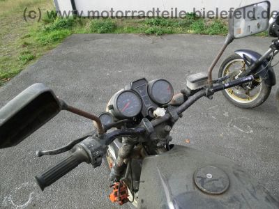 Suzuki_GS_650_G_KATANA_teilzerlegt_orig__Auspuff_-_wie_GS_500_550_750_1100_D_E_G_ES_EF_Katana_21.jpg