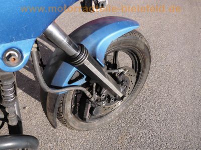 Suzuki_GSX_550_EF_Voll-Verkleidung_blau-weiss_GN71D_mit_4-1_Sport-Auspuff_motad_n-eta_e1_N5SF_-_wie_GSX_400_550_E_ES_71.jpg