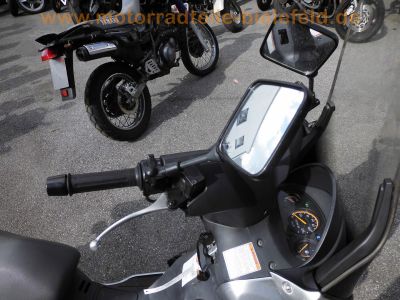 Suzuki_UC125_Epicuro_Roller_silber_SJ125T_CRASH_sehr_gepflegt_hohe_Scheibe_15.jpg