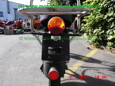 Honda_CB125J_blau_Oldtimer_1978_teilzerlegt_plus_Ersatzteile_Teile_spare-parts_ricambi_repuestos_–_Technik_wie_CB125S_CG125_XL125K_SL125-135.jpg
