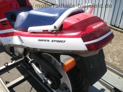 Honda_CBR_1000_F_SC24_HRC_rot-weiss-blau_4in1_Auspuff_Gepaecktraeger_Tourenscheibe_Soziusabdeckung_37.jpg